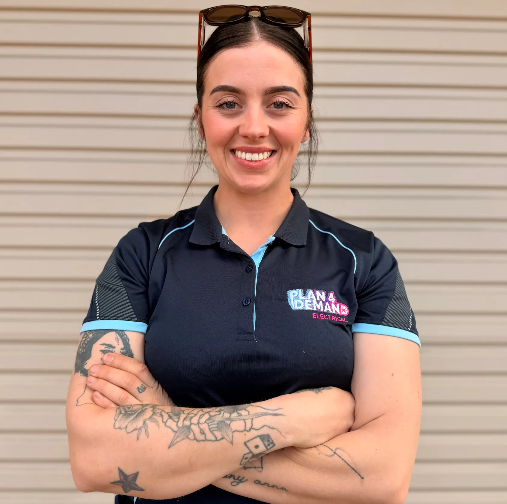 Miranda Flannery, owner of Plan 4 Demand Electrical, in her work polo